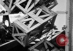 Image of a crane unloading military equipment Bordeaux France, 1918, second 49 stock footage video 65675048400