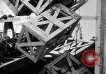 Image of a crane unloading military equipment Bordeaux France, 1918, second 50 stock footage video 65675048400