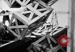 Image of a crane unloading military equipment Bordeaux France, 1918, second 51 stock footage video 65675048400