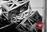 Image of a crane unloading military equipment Bordeaux France, 1918, second 53 stock footage video 65675048400