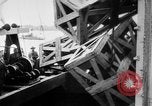 Image of a crane unloading military equipment Bordeaux France, 1918, second 56 stock footage video 65675048400