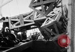 Image of a crane unloading military equipment Bordeaux France, 1918, second 58 stock footage video 65675048400