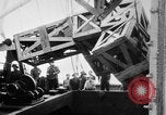 Image of a crane unloading military equipment Bordeaux France, 1918, second 59 stock footage video 65675048400