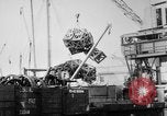 Image of a crane unloading military equipment Bordeaux France, 1918, second 62 stock footage video 65675048400