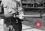 Image of Soldier displays a Lewis machine gun United States USA, 1918, second 1 stock footage video 65675048409