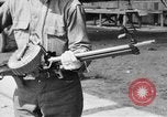 Image of Soldier displays a Lewis machine gun United States USA, 1918, second 5 stock footage video 65675048409