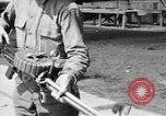 Image of Soldier displays a Lewis machine gun United States USA, 1918, second 7 stock footage video 65675048409