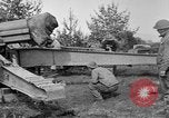Image of Preparing 155mm gun for towing France, 1918, second 11 stock footage video 65675048429