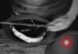 Image of World War 1 American Army helmets assembled at Ford plant Philadelphia Pennsylvania USA, 1918, second 31 stock footage video 65675048436