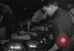 Image of World War 1 American Army helmets assembled at Ford plant Philadelphia Pennsylvania USA, 1918, second 58 stock footage video 65675048436