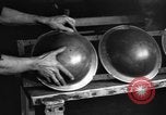 Image of World War 1 American Army helmets assembled at Ford plant Philadelphia Pennsylvania USA, 1918, second 60 stock footage video 65675048436