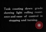 Image of Mark VIII tank driving through a stone wall Bridgeport Connecticut USA, 1918, second 3 stock footage video 65675048450
