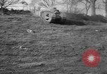 Image of Mark VIII tank driving through a stone wall Bridgeport Connecticut USA, 1918, second 8 stock footage video 65675048450