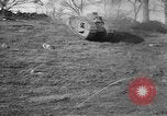 Image of Mark VIII tank driving through a stone wall Bridgeport Connecticut USA, 1918, second 9 stock footage video 65675048450