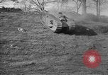 Image of Mark VIII tank driving through a stone wall Bridgeport Connecticut USA, 1918, second 11 stock footage video 65675048450