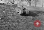 Image of Mark VIII tank driving through a stone wall Bridgeport Connecticut USA, 1918, second 14 stock footage video 65675048450