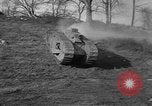 Image of Mark VIII tank driving through a stone wall Bridgeport Connecticut USA, 1918, second 19 stock footage video 65675048450