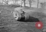 Image of Mark VIII tank driving through a stone wall Bridgeport Connecticut USA, 1918, second 21 stock footage video 65675048450