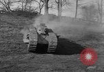 Image of Mark VIII tank driving through a stone wall Bridgeport Connecticut USA, 1918, second 24 stock footage video 65675048450