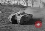 Image of Mark VIII tank driving through a stone wall Bridgeport Connecticut USA, 1918, second 28 stock footage video 65675048450