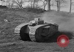 Image of Mark VIII tank driving through a stone wall Bridgeport Connecticut USA, 1918, second 29 stock footage video 65675048450