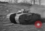 Image of Mark VIII tank driving through a stone wall Bridgeport Connecticut USA, 1918, second 31 stock footage video 65675048450