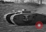 Image of Mark VIII tank driving through a stone wall Bridgeport Connecticut USA, 1918, second 33 stock footage video 65675048450