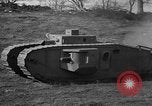 Image of Mark VIII tank driving through a stone wall Bridgeport Connecticut USA, 1918, second 34 stock footage video 65675048450