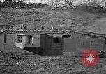 Image of Mark VIII tank driving through a stone wall Bridgeport Connecticut USA, 1918, second 37 stock footage video 65675048450