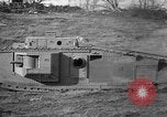 Image of Mark VIII tank driving through a stone wall Bridgeport Connecticut USA, 1918, second 38 stock footage video 65675048450