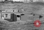 Image of Mark VIII tank driving through a stone wall Bridgeport Connecticut USA, 1918, second 39 stock footage video 65675048450