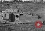 Image of Mark VIII tank driving through a stone wall Bridgeport Connecticut USA, 1918, second 42 stock footage video 65675048450