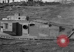 Image of Mark VIII tank driving through a stone wall Bridgeport Connecticut USA, 1918, second 43 stock footage video 65675048450