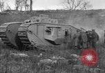 Image of Mark VIII tank driving through a stone wall Bridgeport Connecticut USA, 1918, second 47 stock footage video 65675048450