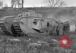 Image of Mark VIII tank driving through a stone wall Bridgeport Connecticut USA, 1918, second 48 stock footage video 65675048450