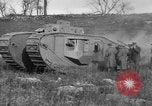 Image of Mark VIII tank driving through a stone wall Bridgeport Connecticut USA, 1918, second 49 stock footage video 65675048450