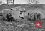 Image of Mark VIII tank driving through a stone wall Bridgeport Connecticut USA, 1918, second 50 stock footage video 65675048450
