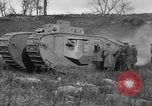 Image of Mark VIII tank driving through a stone wall Bridgeport Connecticut USA, 1918, second 51 stock footage video 65675048450