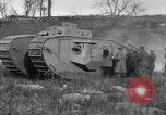 Image of Mark VIII tank driving through a stone wall Bridgeport Connecticut USA, 1918, second 53 stock footage video 65675048450