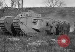 Image of Mark VIII tank driving through a stone wall Bridgeport Connecticut USA, 1918, second 54 stock footage video 65675048450