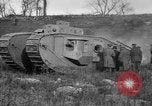 Image of Mark VIII tank driving through a stone wall Bridgeport Connecticut USA, 1918, second 55 stock footage video 65675048450