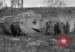 Image of Mark VIII tank driving through a stone wall Bridgeport Connecticut USA, 1918, second 56 stock footage video 65675048450