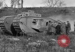 Image of Mark VIII tank driving through a stone wall Bridgeport Connecticut USA, 1918, second 57 stock footage video 65675048450
