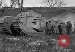 Image of Mark VIII tank driving through a stone wall Bridgeport Connecticut USA, 1918, second 58 stock footage video 65675048450