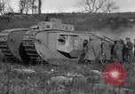 Image of Mark VIII tank driving through a stone wall Bridgeport Connecticut USA, 1918, second 59 stock footage video 65675048450