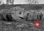 Image of Mark VIII tank driving through a stone wall Bridgeport Connecticut USA, 1918, second 60 stock footage video 65675048450