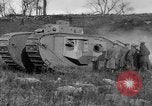 Image of Mark VIII tank driving through a stone wall Bridgeport Connecticut USA, 1918, second 61 stock footage video 65675048450