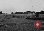 Immagine di Trattore Ford disegnati reaper United States USA, 1918, secondo 12 filmato di repertorio 65675048692