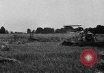 Immagine di Trattore Ford disegnati reaper United States USA, 1918, secondo 14 filmato di repertorio 65675048692