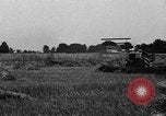 Immagine di Trattore Ford disegnati reaper United States USA, 1918, secondo 15 filmato di repertorio 65675048692